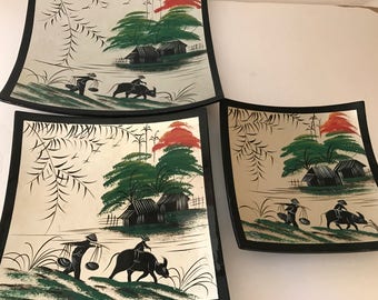 Set of three vintage, Vietnam Sushi  lacquer trays has stunning color and beautiful hand painted rural scene design