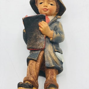 Vintage hand carved and hand painted Carving Little Boy Holding Book, Jobin Brienz Switzerland. figurine image 1