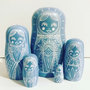 nesting dolls, duck egg blue decor, russian matryoshka dolls.