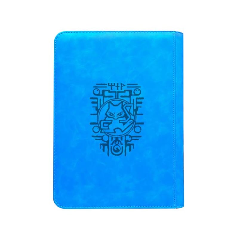 May include: A bright blue rectangular notebook with rounded corners. The front cover features a centered black graphic design depicting a stylized cat-like creature enclosed within a circular frame, surrounded by intricate geometric line patterns.
