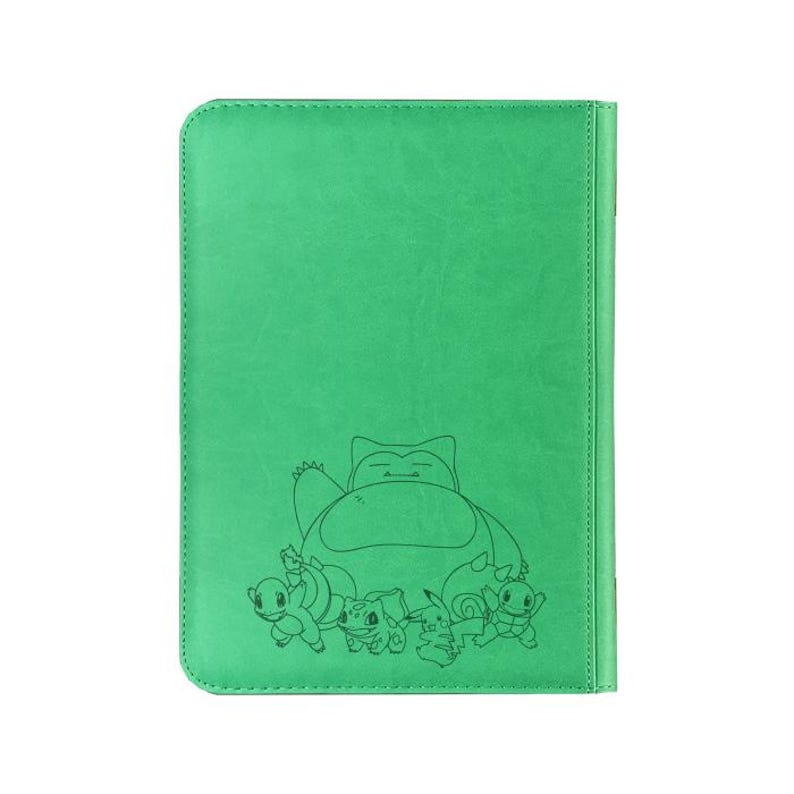 May include: Green card holder featuring a black line drawing of Snorlax and other Pok&eacute;mon characters. The card holder has a stitched border and a textured surface. The design includes a sleeping Snorlax and several smaller Pok&eacute;mon.