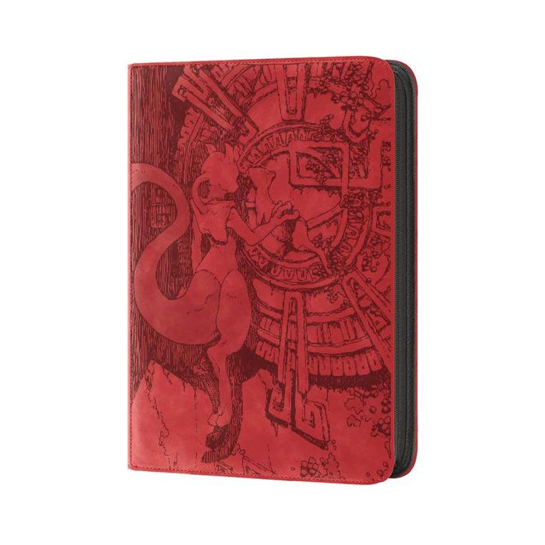 May include: A red zippered binder featuring a dark red embossed illustration of a bipedal creature with a long tail standing before a circular geometric pattern. The cover has a textured surface and a black zipper running along the right side edge.