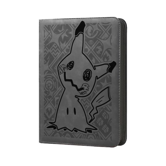 mimikyu pokemon card binder Not every masterpiece wants the spotlight  Hand-painted under the moonlight, made for collectors who love the cute, creepy, and one of a kind! Which collection would you keep Mimikyu Page in My Pokmon