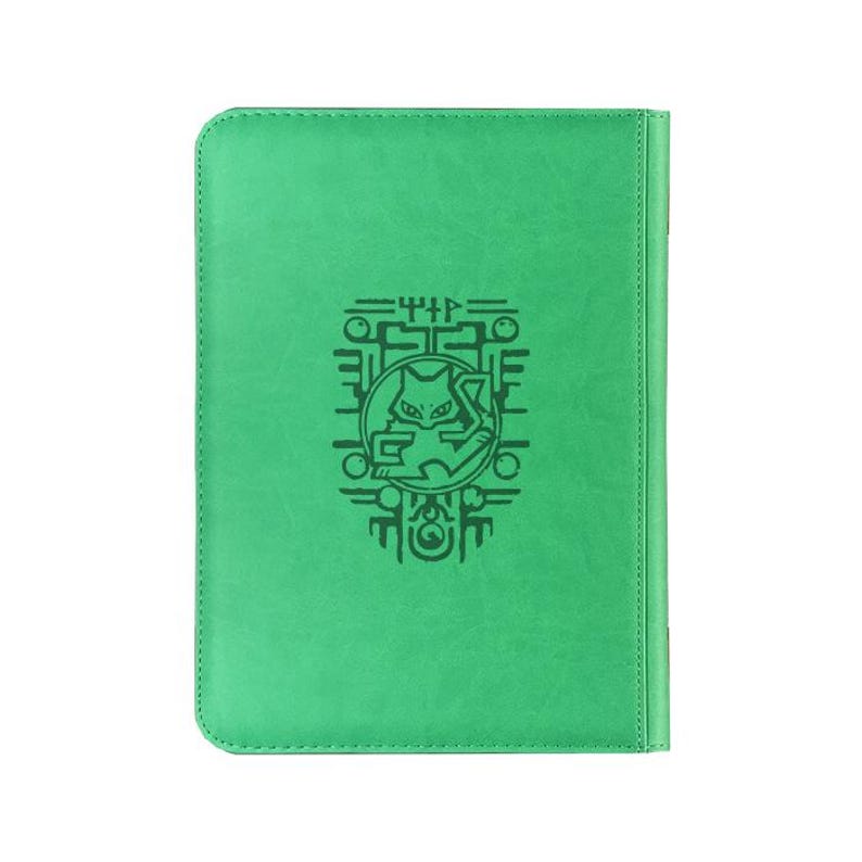May include: A bright green rectangular notebook with rounded corners. The cover features a dark green embossed graphic of a stylized cat-like creature centered within a geometric frame, accompanied by abstract symbols above and below the design.