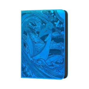 May include: A rectangular trading card binder with a metallic blue finish. The front cover features a detailed embossed illustration of a Lapras creature emerging from stylized ocean waves, with a dark blue spine and black interior edges.