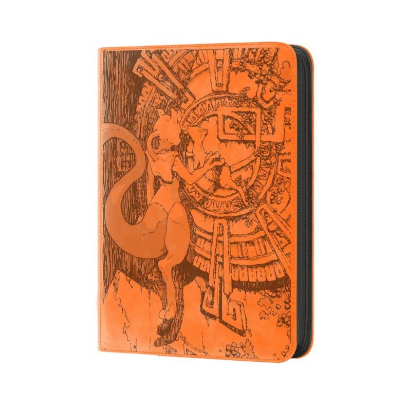 May include: An orange rectangular binder featuring a dark brown etched illustration of the character Mewtwo standing before a circular ancient stone-like structure with intricate geometric patterns and a long tail curving to the left side.