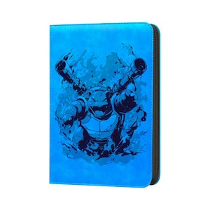May include: A blue zippered binder featuring a black and blue illustration of a turtle-like creature with cannons. The binder has a textured surface and a black zipper. The design is a stylized graphic.