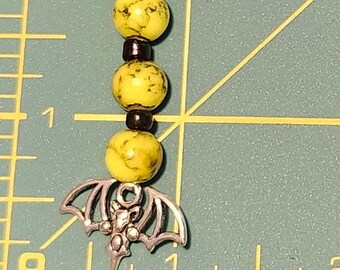 small bat with yellow & black beads zipper pull