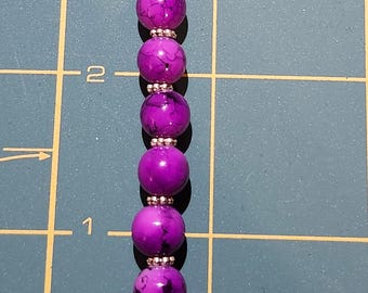 purple 'handmade' charm zipper pull