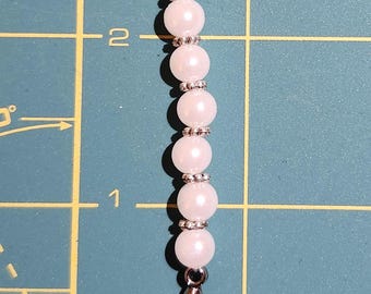 Fleur de lis zipper pull