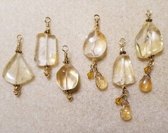 Leo Citrine pendants on silk thread, gold or silver plated chain
