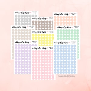 May include: A set of 10 sheets of transparent stickers with 100 mini dots each. The dots are in various pastel colours, including peach, mint, slate, lilac, rose, butter, coffee, dove, and latte. The stickers are labelled with the colour name and "allycat's shop".