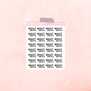 May include: A sheet of stickers with the words "NIGHT NIGHT NIGHT NIGHT" repeated multiple times. The words "shift shift shift shift" are written below each line of "NIGHT NIGHT NIGHT NIGHT". The stickers are on a pink background.