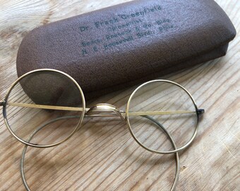 red metal eyeglass frames