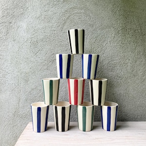 Hand painted Ceramic Striped Cup with multiple colors, blue, red, pink, green, black