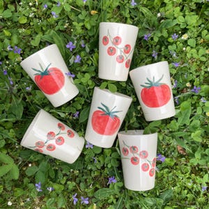Handpainted ceramic cup with tomatoes