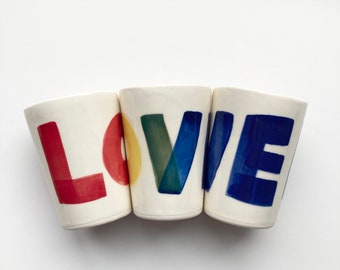 Ceramic Cup painted with bold LOVE letters