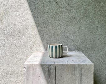 Pin striped ceramic espresso mug