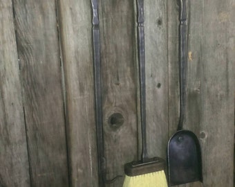 Wrought iron fireplace tool set.