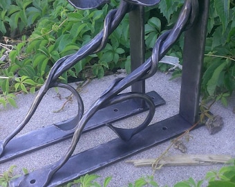 Wrought iron leaf and vine shelf brackets