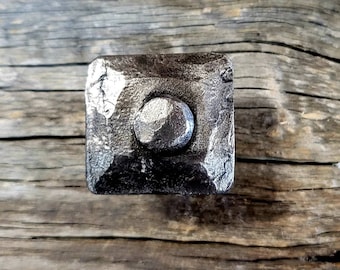 Hammered iron knob with rivet