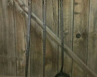 Wrought iron fireplace tool set.