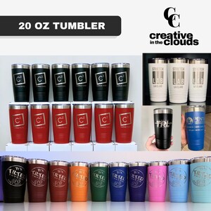 May include: A collection of 20 oz tumblers in various colours including black, red, white, blue, orange, green, purple, and pink. Each stainless steel tumbler features a laser-engraved logo or text, such as C2 Consultants, Stretch Lab, and Tilted Tavern.