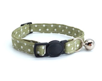 Dusky green spot fabric with breakaway safety collar