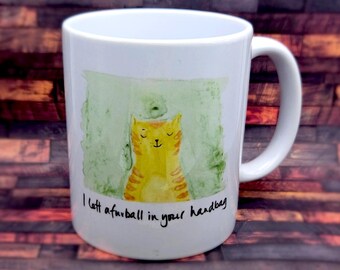 I left a furrball in your handbag cat Mug