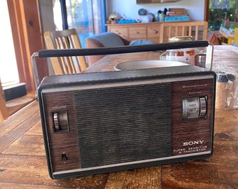 Vintage portable Sony super sensitive 9 transistor radio, made in Japan on the late 60's. Battery operated.