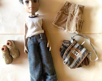 Dylan Bratz Funk Out, two partial outfits, two pairs of shoes, a necklace and a shoulder bag