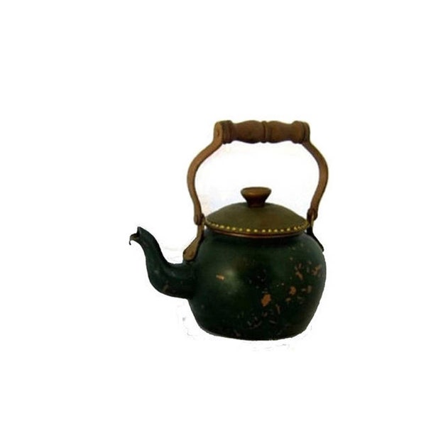 Old copper green chippy paint tea kettle with a wood handle and gold dots on the lid.