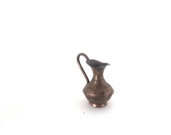 Oriental small true vintage hammered copper vintage pitcher, handled ornate jug