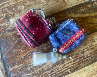 Two purses and a baby bottle from Bratz Babyz Twiins series edition 2, 2005, twins Nona and Tess