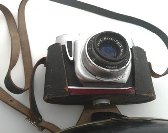 Beirette k 1960s vintage camera, made by Biere East German company, in a hard black leather case with a strap