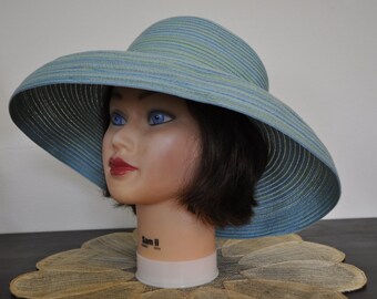 Scala Collesione Wide brim hat. Turquoise with mint green touch and decorative bow. Great Kentucky Derby style.