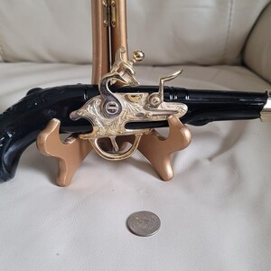 Vintage Avon Wild Country Aftershave Bottle: Dueling Revolver II Embossed Glass