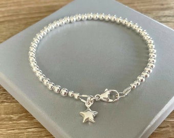 Sterling Silver Star Charm Bracelet: Beaded Ball Design