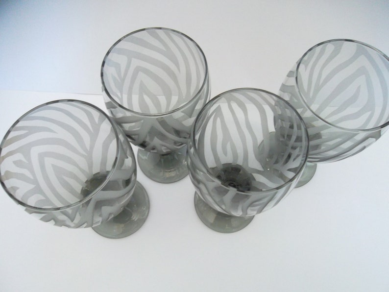 Black drinking glasses etched with zebra print. Set of 4. | Etsy
