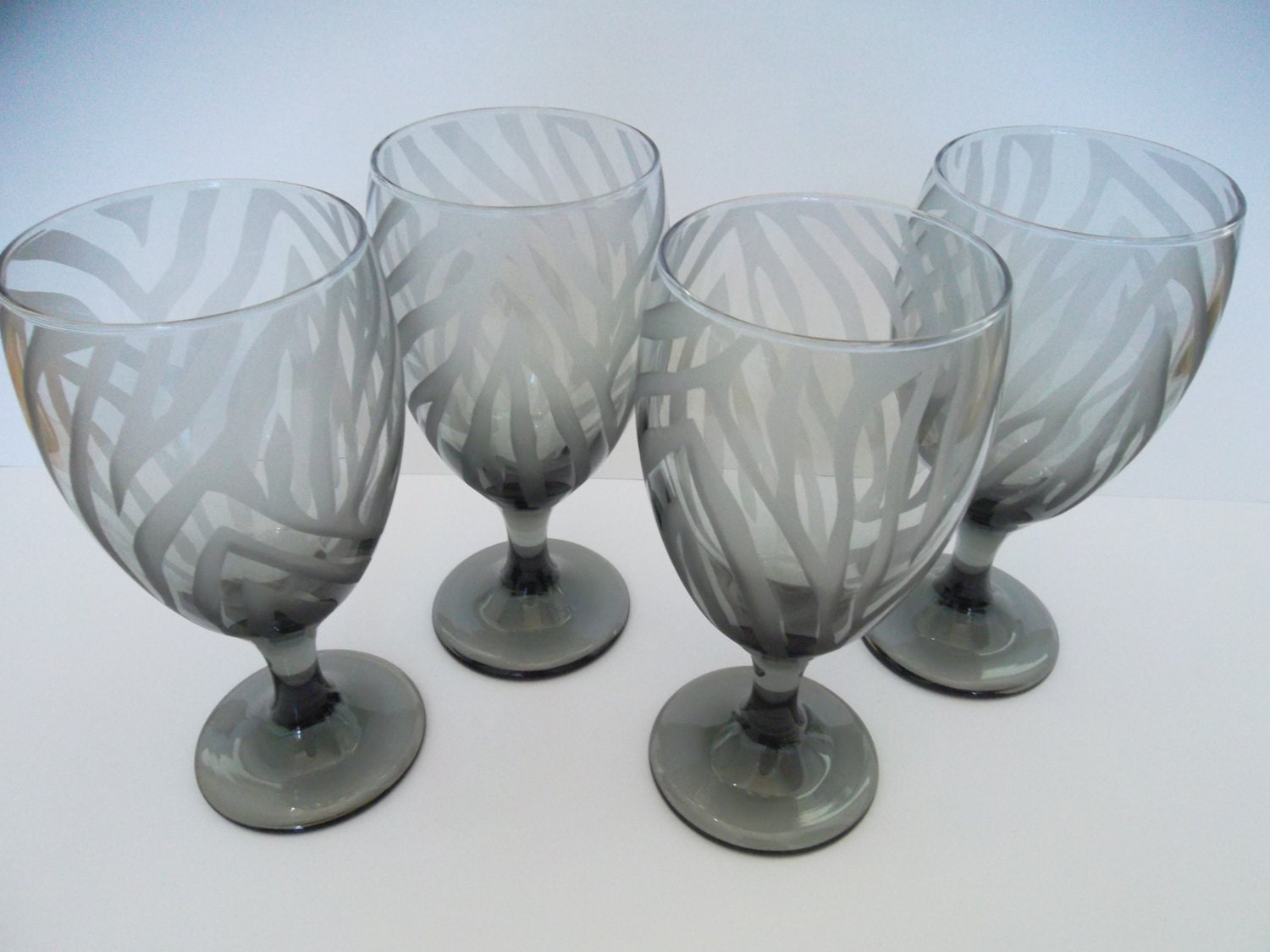 Black drinking glasses etched with zebra print. Set of 4. Etsy