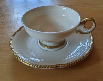 Vintage Castleton China Demitasse cup and saucer in Sovereign pattern.