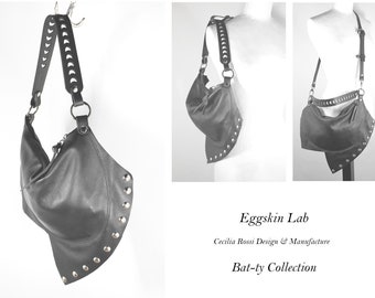New soft leather handbag, bat-ty collection, can be worn both crossbody and on the shoulder, featuring studs and a hand-perforated handle