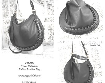 Italian leather bag inspired by Giger's art, alien bag with a goth dark fashion style, backbone spine and woven goth purse, gothic handbag