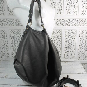 Astrea is a roomy and soft shoulder bag, crossbody bag in black leather, hobo italian leather purse with studs on handle, minimalist handbag image 6