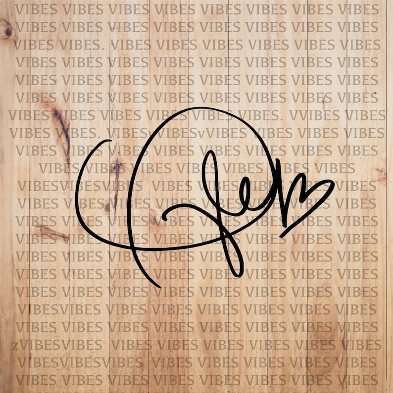 May include: A black and white cursive signature that says "Jem" on a woodgrain background.