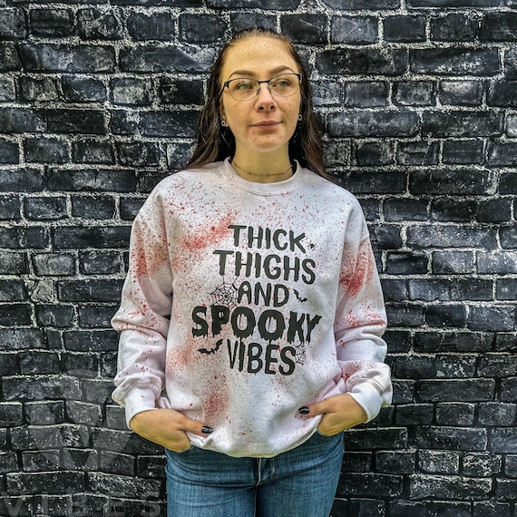 Thick thighs and spooky vibes blood splatter tie dye white halloween October sweatshirt