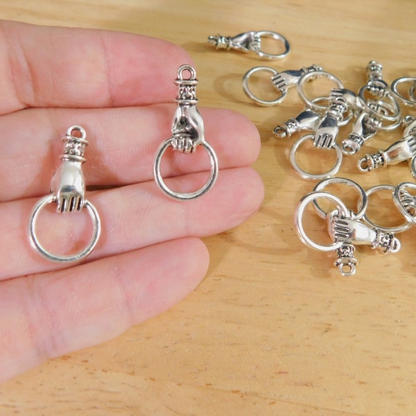 Hand Holding Ring Pendant / Charm, Antique Silver Tone, 27mm 1" (occult spooky goth gothic dark academia skeleton key connector alloy)