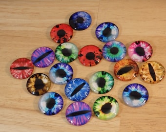 May include: Assortment of colorful glass eyes with different patterns and colors, including red, blue, green, yellow, and purple. The eyes are about 1 inch in diameter and have a black pupil.