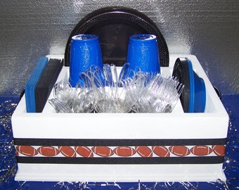 Football table top caddy used for napkins, paper plates, Utensils and more! Great for back yard dining, camping or any occasion.