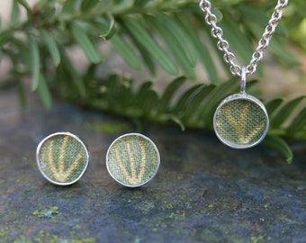 Beautiful silver necklace with green and gold fabric